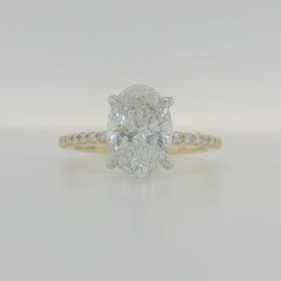 Yellow Gold Oval Diamond Engagement Ring With Hidden Halo